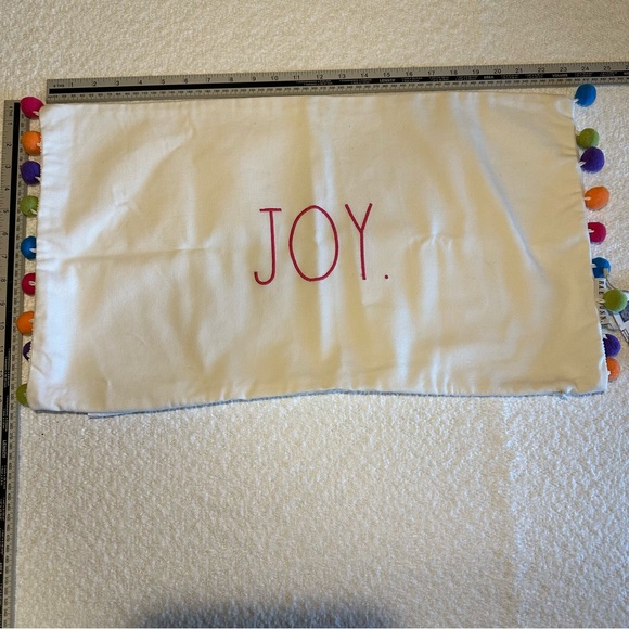 Rae Dunn JOY Holiday Pillow Cover with Pom Poms Rectangular 13”x23” - Picture 1 of 7